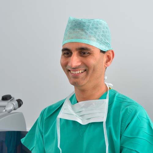 Mr Sanjay Mantry looking happy after cataract surgery at Vision Scotland